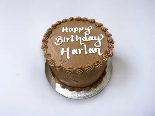 Rich chocolate birthday cake with decorations