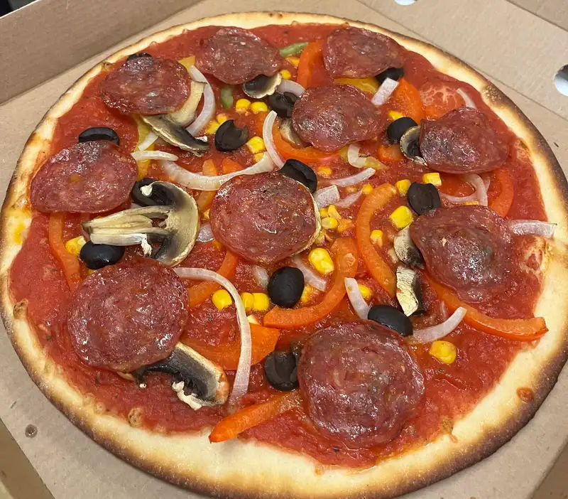Freshly baked pepperoni pizza from Belinda's Bakery