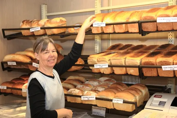 Ruth Ellis at the bread shelf in Belinda's Bakery